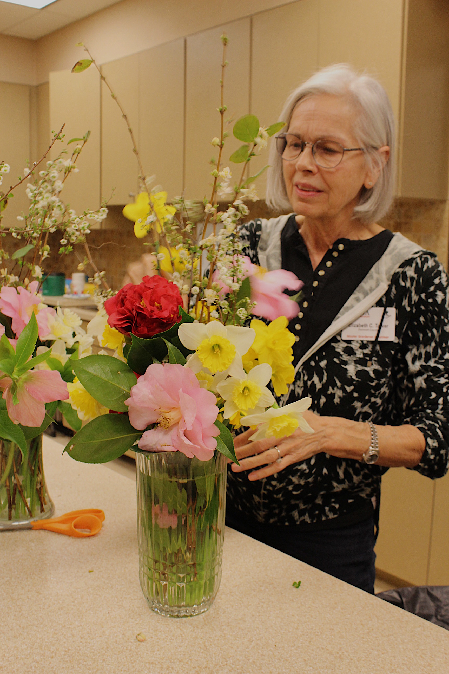 Our talented floral artist at work to grace our tables with beauty and fragrance