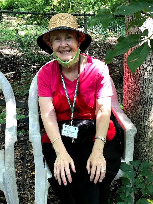 This volunteer docent is really enjoying her assignment